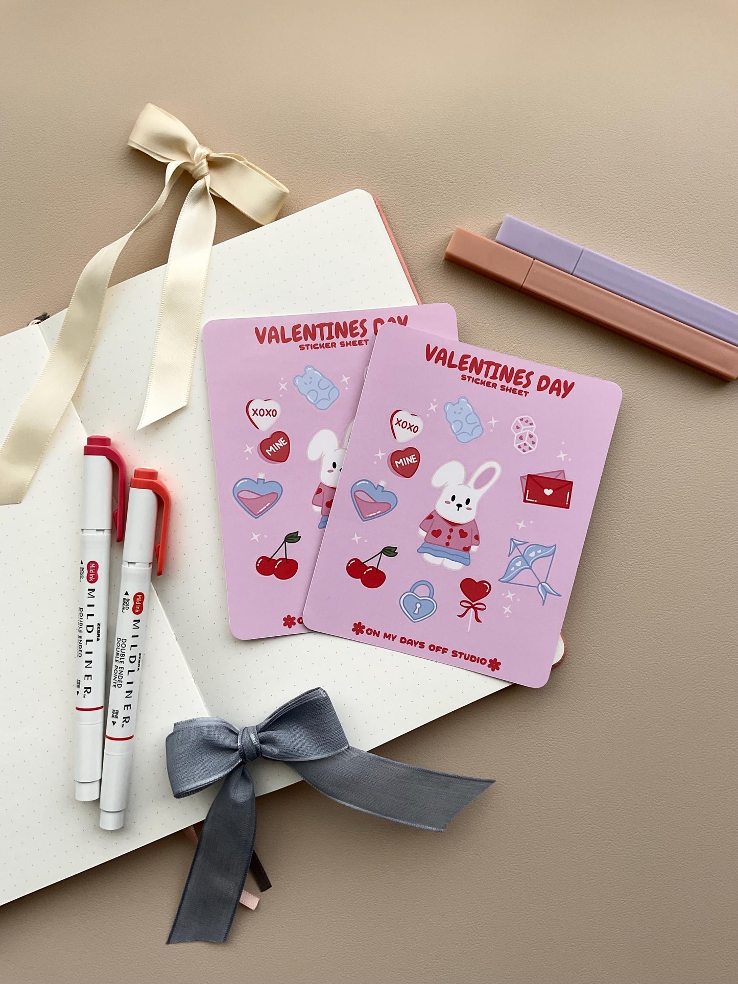 This stationery sticker sheet features a Valentine’s Day theme and has 11 colorful illustrations. These illustrations include a cute bunny in a valentine's outfit and heart themed items. These glossy stickers are perfect for planners and bullet journals.