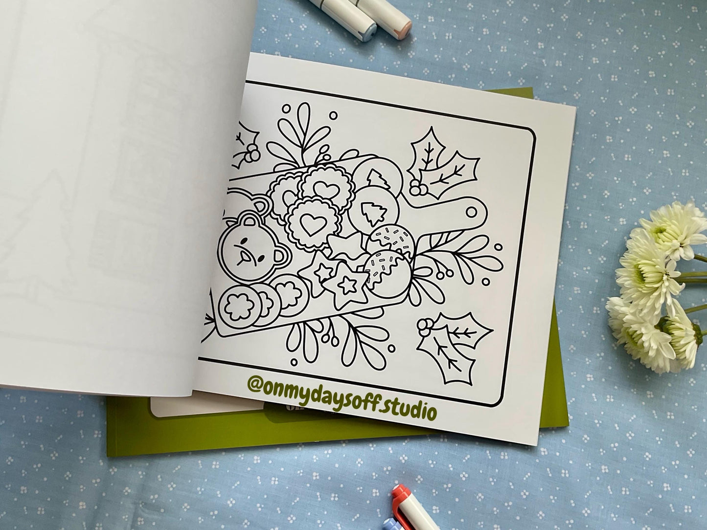 Juni and friends coloring book volume 4 is winter themed - plate of holiday cookies