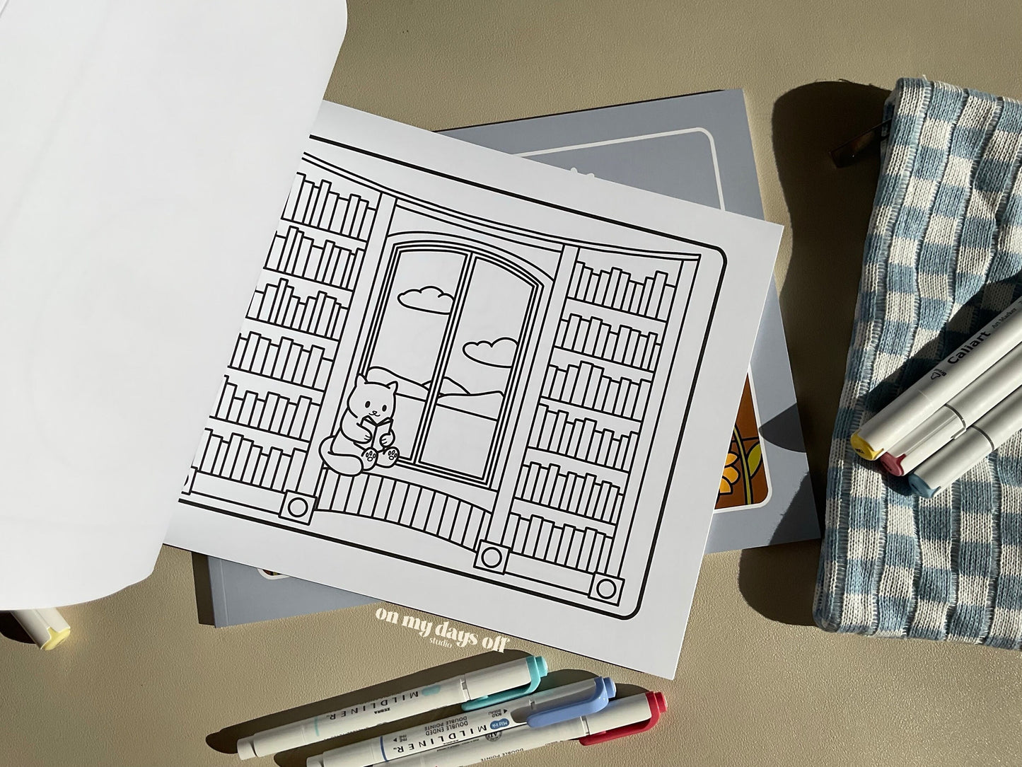 This adorable coloring book comes with 20 illustrated pages on high quality paper, which makes a perfect canvas for your coloring session. This page is a reading library nook perfect for this book worm cat.