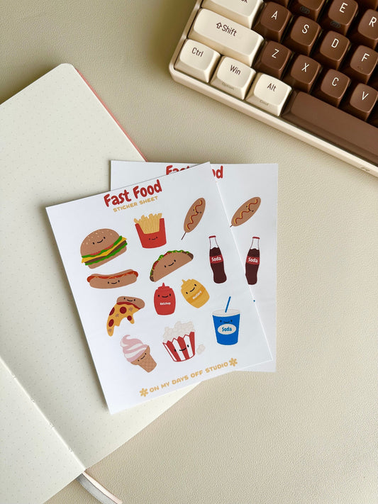 This stationery sticker sheet features an American fast food theme and has 12 colorful illustrations. These food illustrations include classics like hamburger, fries, corn dog, soda, pizza and much more. These glossy stickers are perfect for planners and bullet journals.
