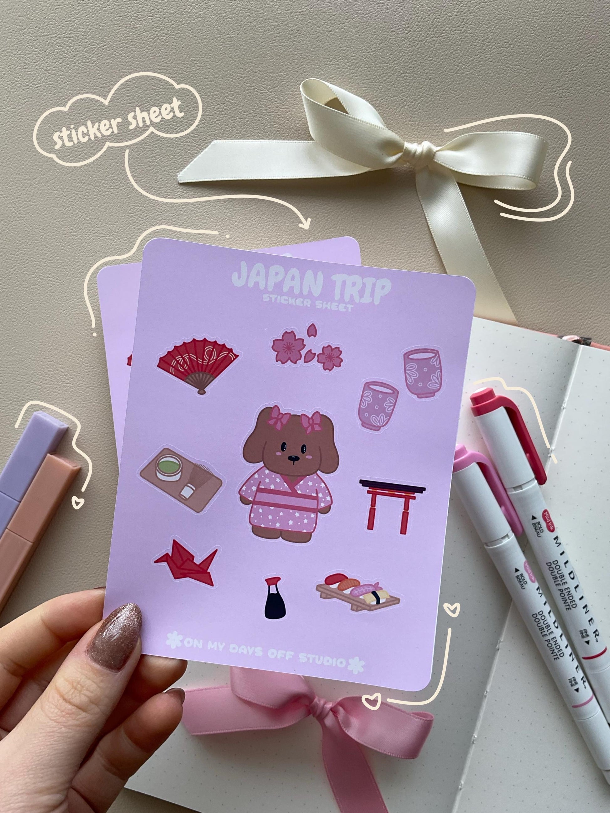 This stationery sticker sheet features a Japan theme and has 10 colorful illustrations, including a dog in a Japanese traditional dress, hand fan, green tea, matcha set, cherry blossoms, sushi and more. These glossy stickers are perfect for planners and bullet journals.&nbsp;