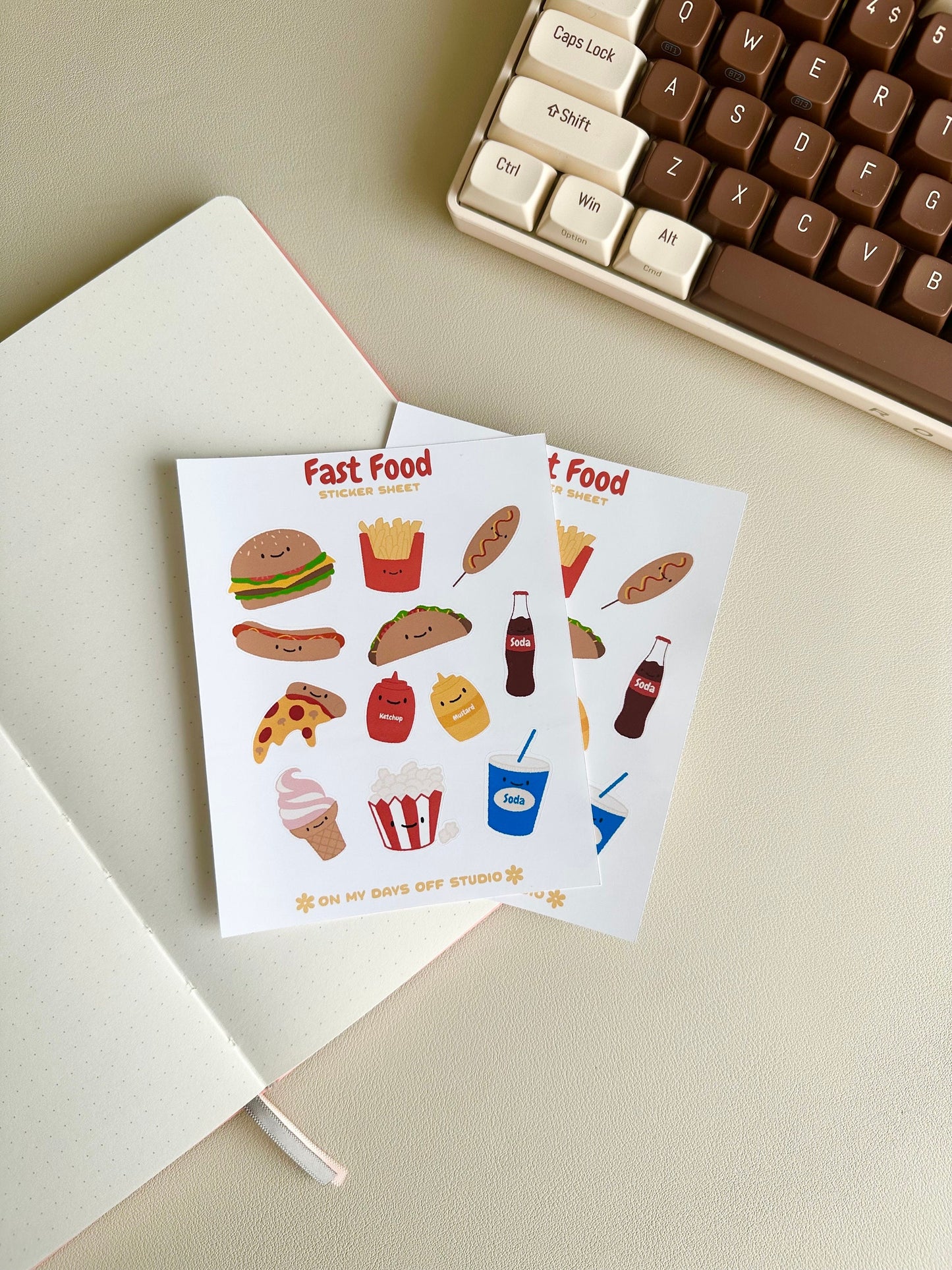 This stationery sticker sheet features an American fast food theme and has 12 colorful illustrations. These food illustrations include classics like hamburger, fries, corn dog, soda, pizza and much more. These glossy stickers are perfect for planners and bullet journals.