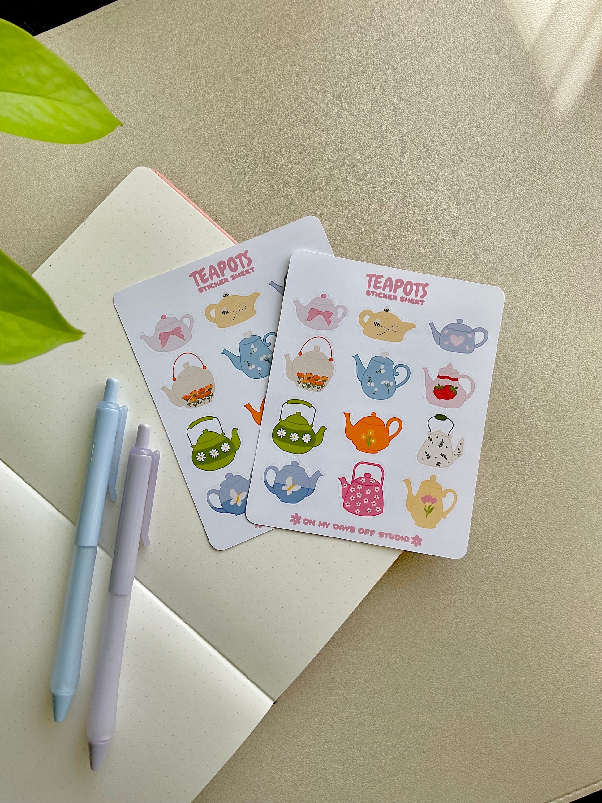 This stationery sticker sheet features a colorful teapot theme and has 12 colorful illustrations. These glossy stickers are perfect for planners and bullet journals.