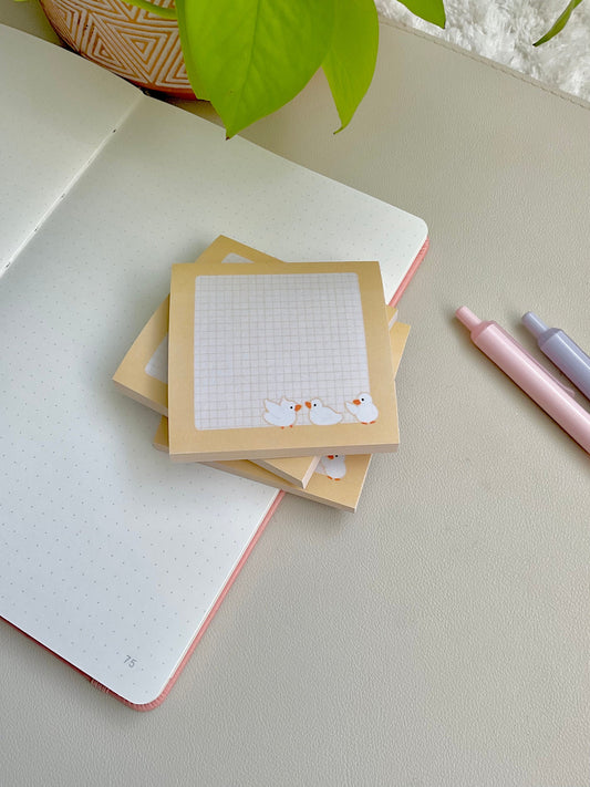 This adorable yellow sticky note pad features 3 little ducks in a row. Perfect for cute reminders, playful notes and daily to dos.