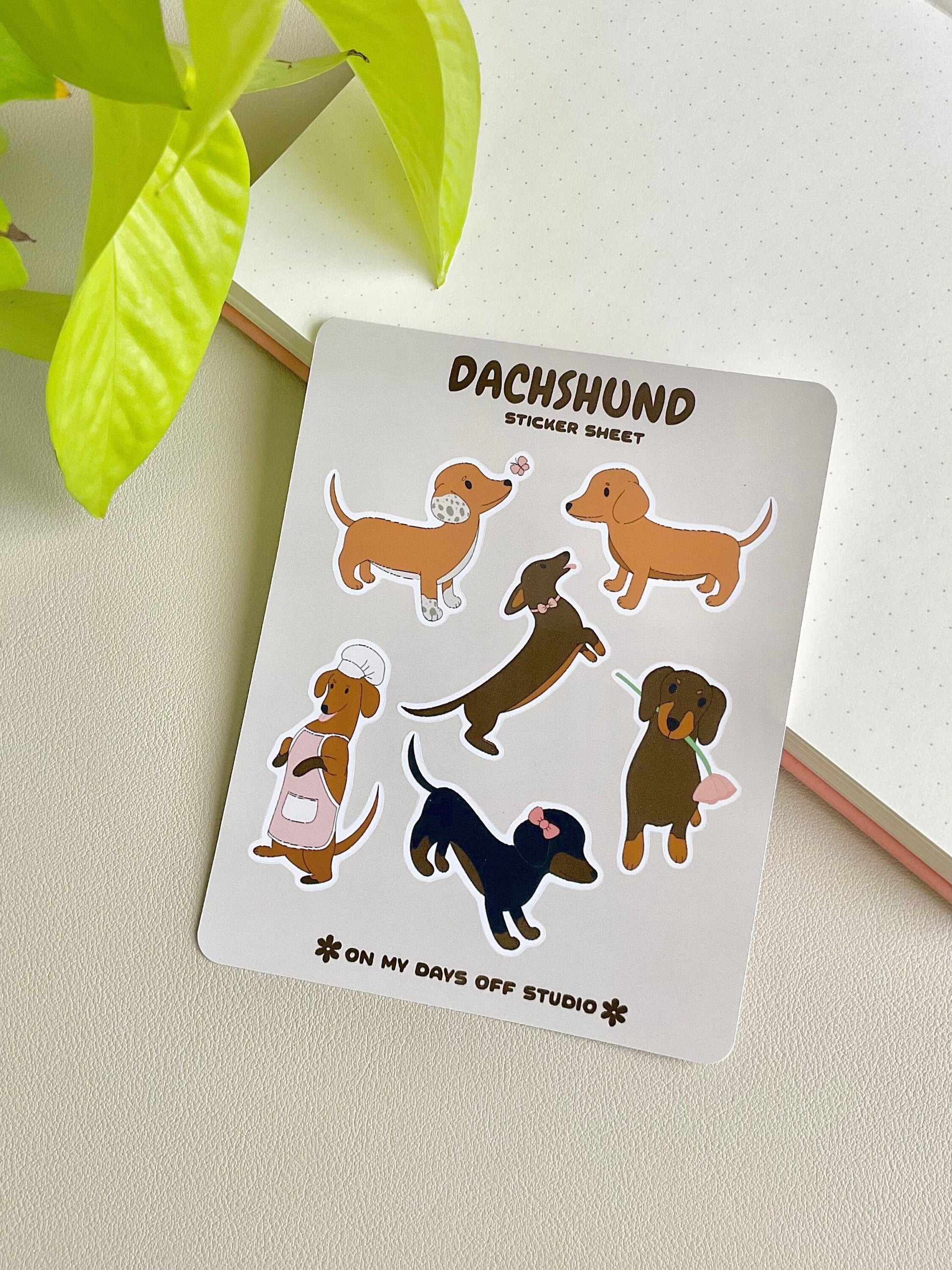 This stationery sticker sheet features 6 Dachshund puppy themed illustrations. These stationery stickers are glossy and perfect for all your planner and bullet journal needs.