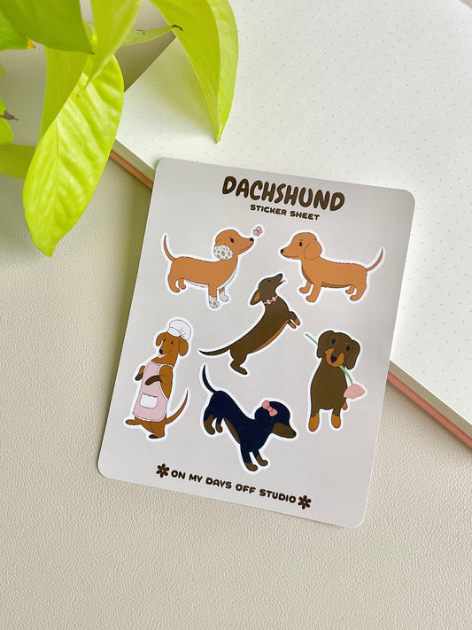 This stationery sticker sheet features 6 Dachshund puppy themed illustrations. These stationery stickers are glossy and perfect for all your planner and bullet journal needs.
