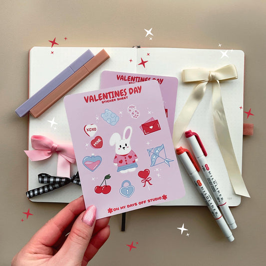 This stationery sticker sheet features a Valentine’s Day theme and has 11 colorful illustrations. These illustrations include a cute bunny in a valentine's outfit and heart themed items. These glossy stickers are perfect for planners and bullet journals.