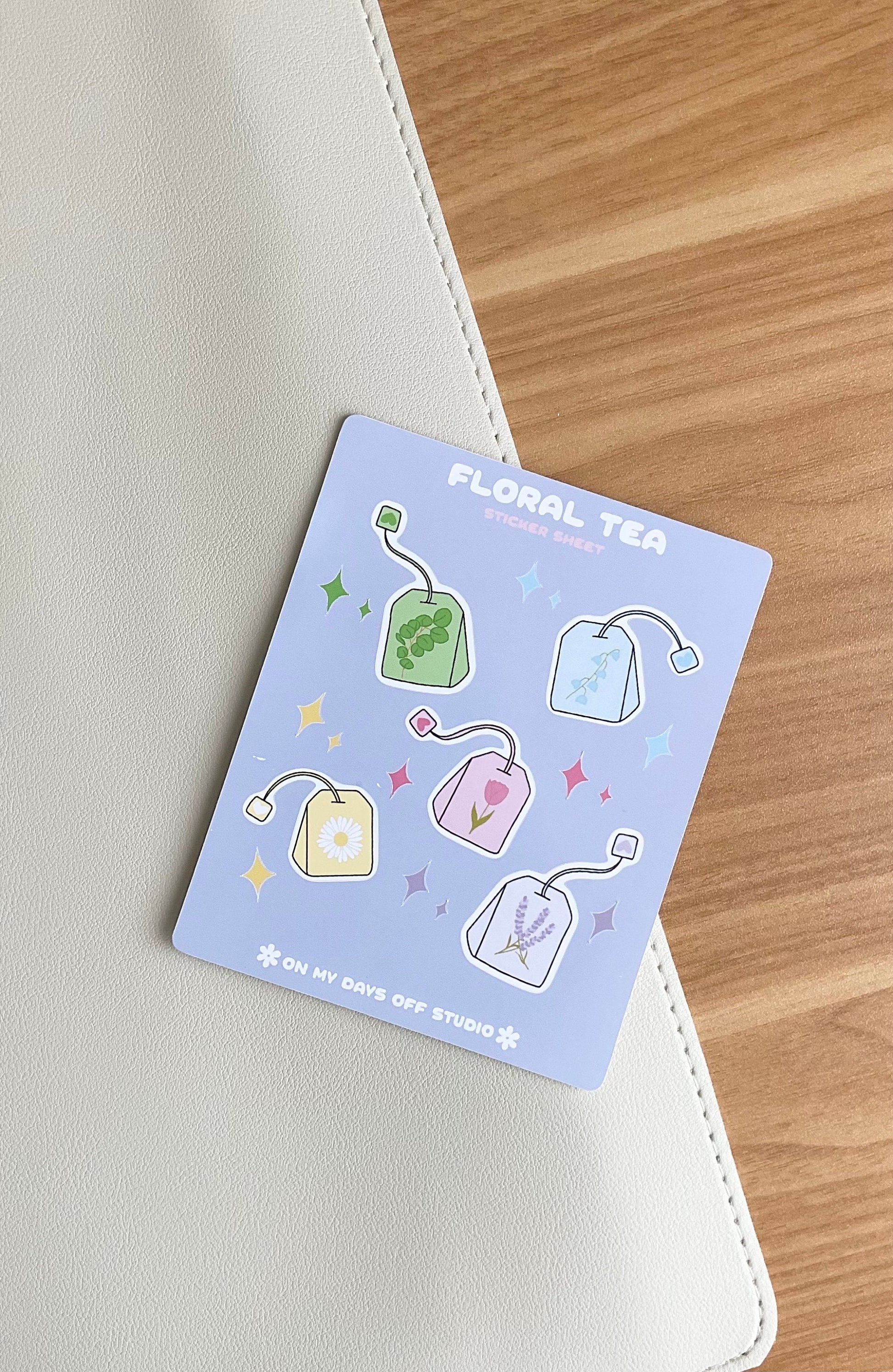 This kawaii floral tea sticker sheet features 5 colorful illustrations. These illustrations feature whimsical tea bags with floral designs. These glossy stickers are perfect for bullet journals and planners.&nbsp;