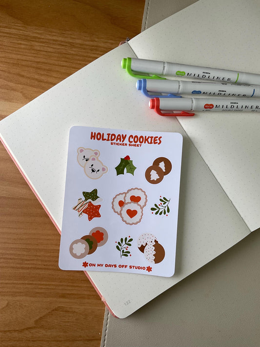 This stationery sticker sheet features a holiday cookies theme and has 9 colorful illustrations. These cookie illustrations includes cookies shaped as stars, mistletoe, polar bear heads, and more. These glossy stickers are perfect for planners and bullet journals.&nbsp;