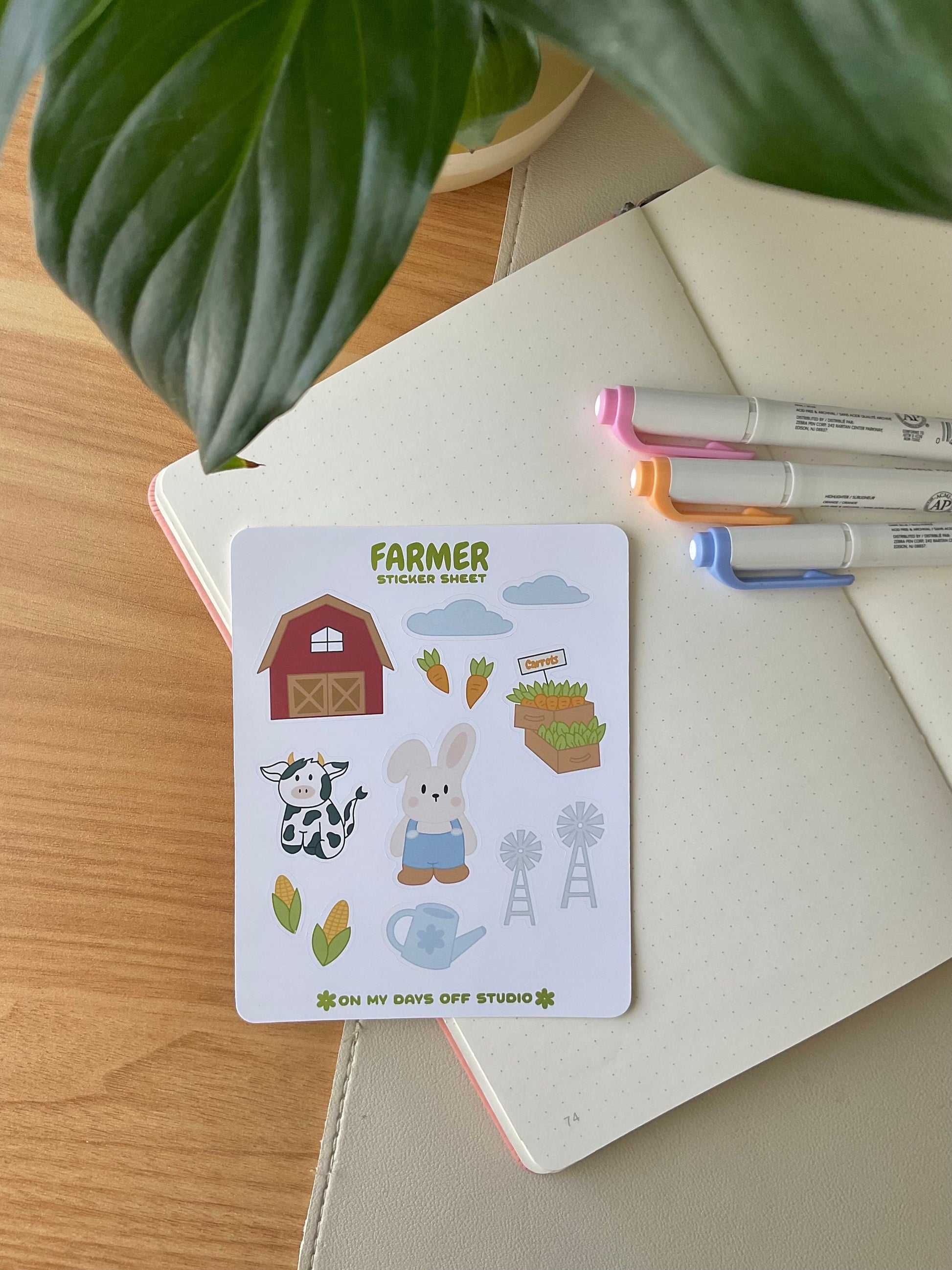  This stationery sticker sheet features a farm theme and has 13 colorful illustrations. These stickers include illustrations like a barn house, clouds, carrots, a bunny farmer, and cow. These glossy stickers are perfect for planners and bullet journals.&nbsp;