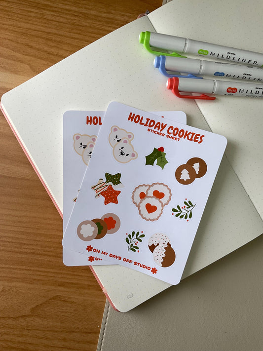 This stationery sticker sheet features a holiday cookies theme and has 9 colorful illustrations. These cookie illustrations includes cookies shaped as stars, mistletoe, polar bear heads, and more. These glossy stickers are perfect for planners and bullet journals.&nbsp;
