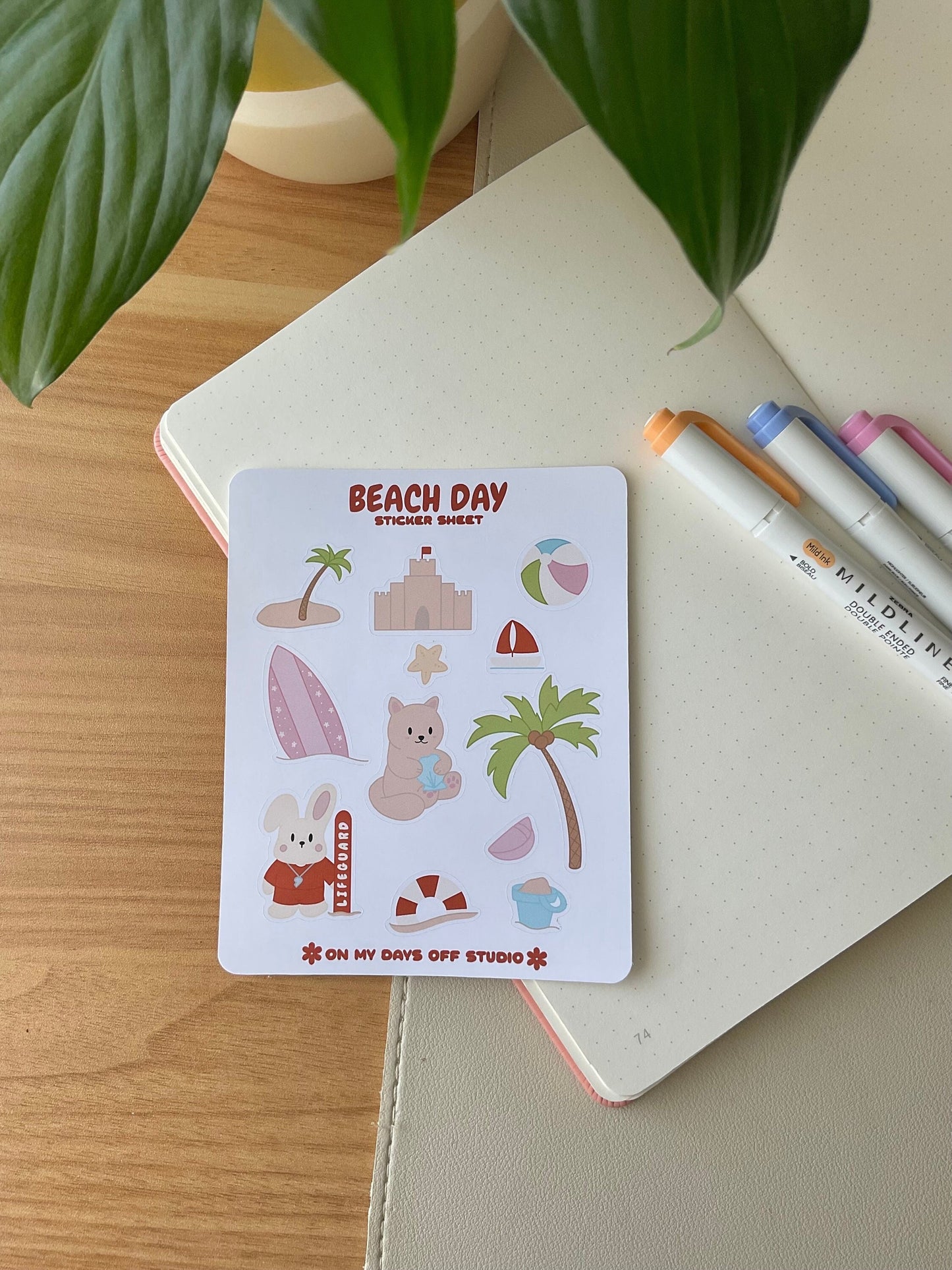 This stationery sticker sheet features a beach day theme and has 12 colorful illustrations. These illustrations include a bunny life guard, cat playing with sand, sand castle, palm trees, surf board and beach toys. These glossy stickers are perfect for planners and bullet journals.&nbsp;